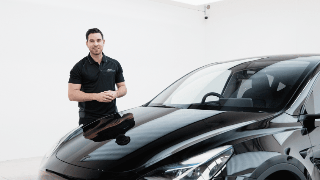 FleetShield team applying Paint Protection Film to a BMW